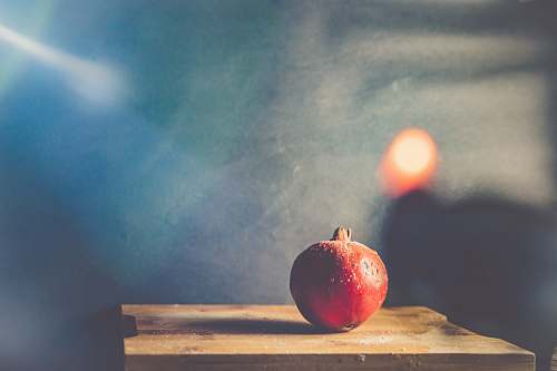 fruit red promegranite on table apple