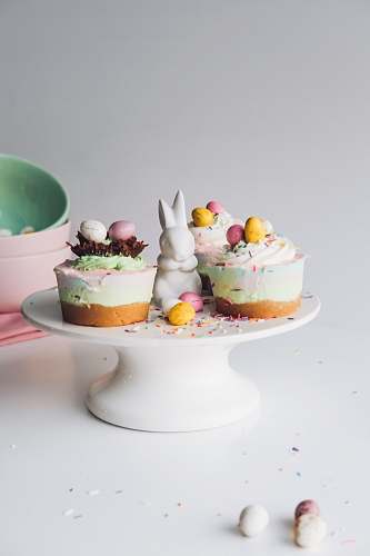 food cakes placed on white ceramic cake stand cake