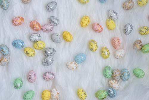 food assorted-color Easter eggs on white textile easter