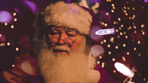 bokeh photography of Santa Claus