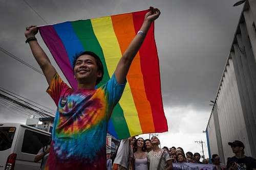 symbol man holding LGBT flag human