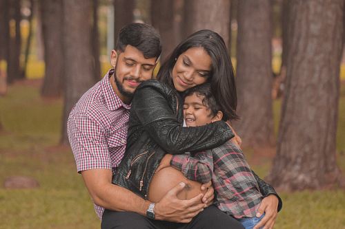 man hugging a woman
