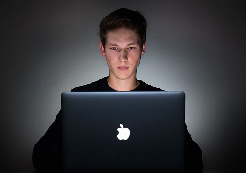 man using laptop