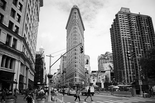 people crossing the street near Y city intersection