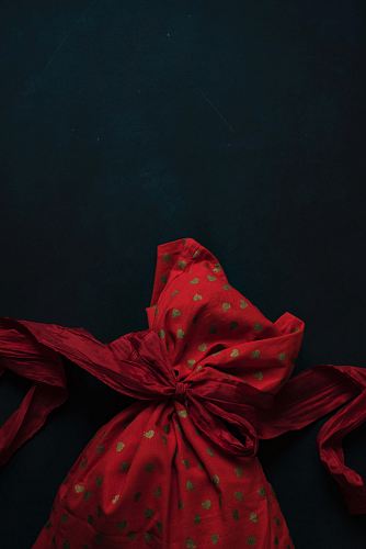 red and beige heart-printed cloth
