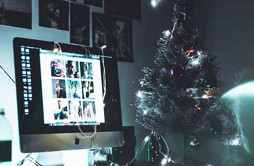 display turned-on silver iMac electronics
