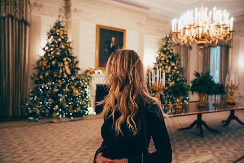 woman in black long-sleeved dress
