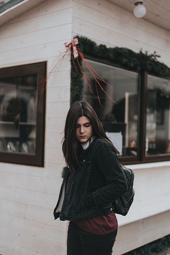 woman standing near store during daytime