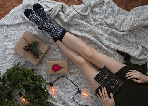 woman wearing gray and black socks