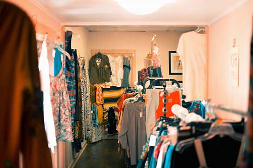 shop assorted-colored apparel in wardrobe boutique