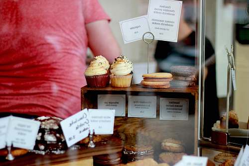 shop cupcakes on wooden display rack cake