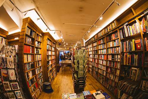 book pile of books inside library bookstore