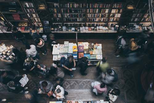 indoors aerial view of people inside library book