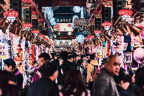 human people in street during nighttime market