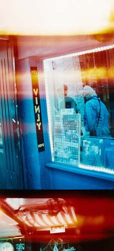 human person in blue lab gown inside room shop