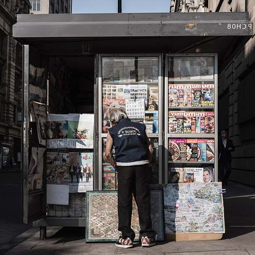 human woman outside booth shop