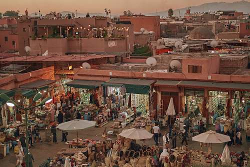 market aerial photography of buildings and people during daytime bazaar
