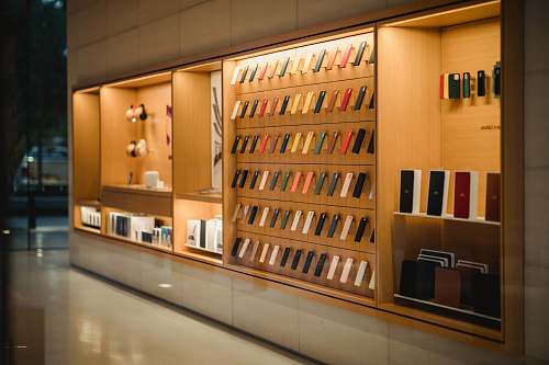 brown brown wooden display cabinet book