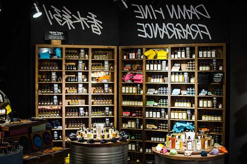 shelf fragrance bottles and boxes on wooden rack and tables hongkong