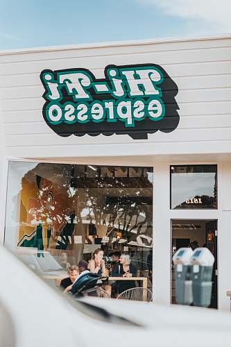 person Hi-Fi Espresso building during daytime human