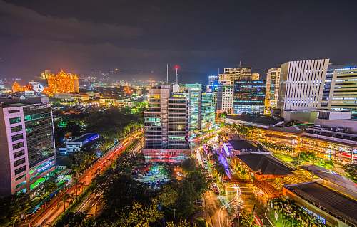 city long-exposure photo of urban city with lights urban