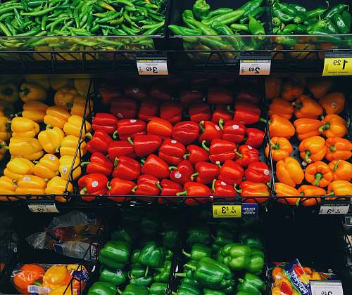 market pile of bell peppers and beans at the grocery plant