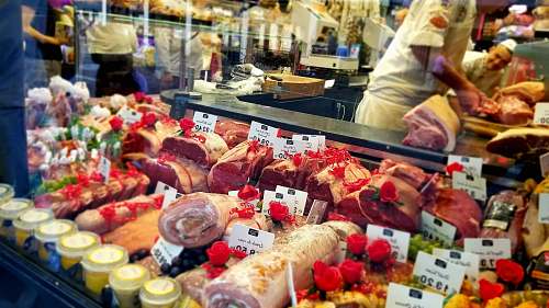 person sliced meat on market human