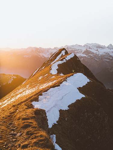 nature aerial view photography of mountain with snow landscape