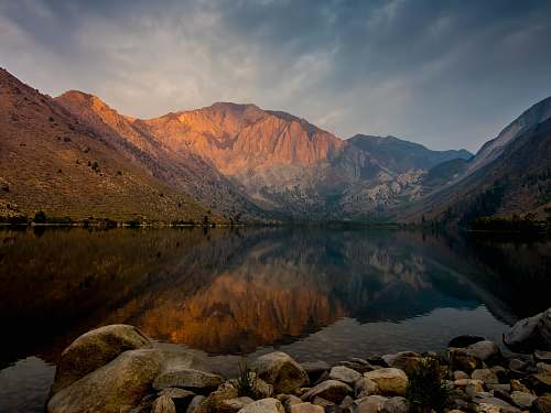 nature Convict Lake in California viewing mountain under white and blue sky during daytime mountain range