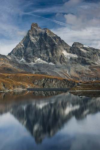 nature gray rocky mountain under blue sky landscape