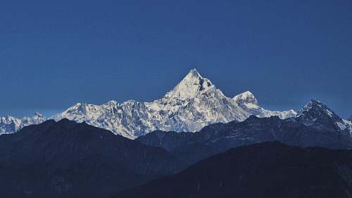 mountain mountain range covered with snow mountain range