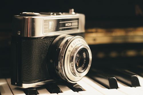 black and silver point-and-shoot camera