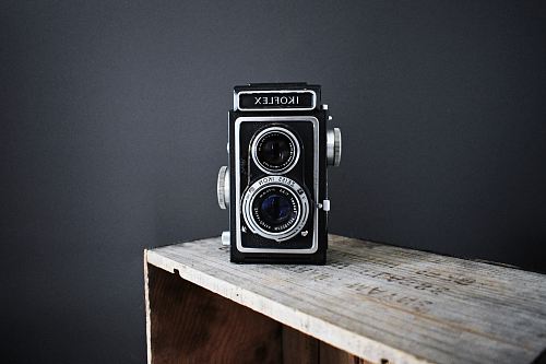 black camera on side table