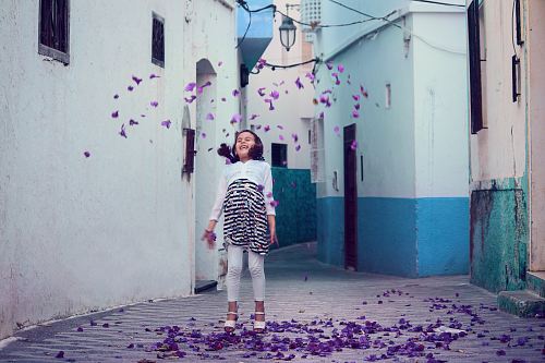 falling petals under girl