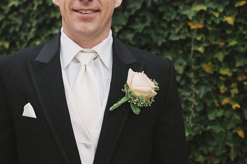 man wearing black suit jacket