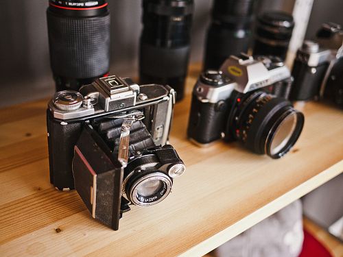 photo of two black cameras