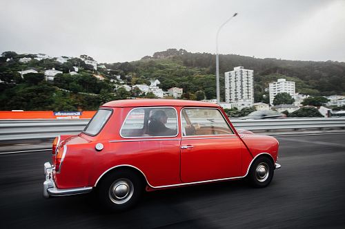 red car in the road