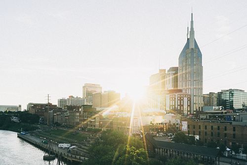 urban city near lake at daytime