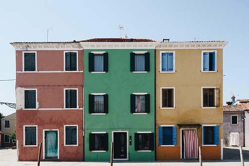 town brown, green, and red houses urban