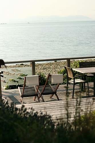 chair tables and chairs near seashore patio