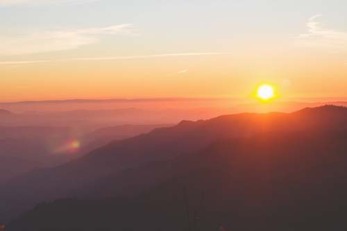 sunrise silhouette of mountain during golden hour dusk
