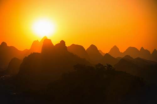 sunset mountain silhouette silhouette during golden hour sunrise