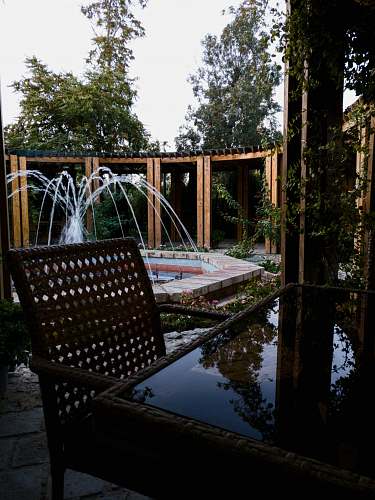 patio shallow focus photo of outdoor water fountain porch