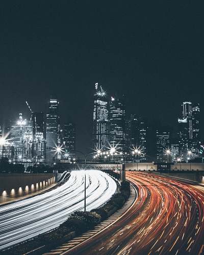 night timelapse photo of the road with cars light
