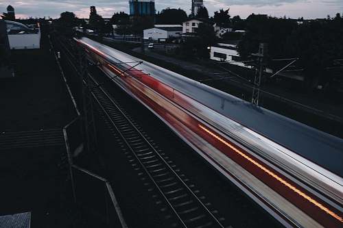 transportation time lapse photography of train vehicle