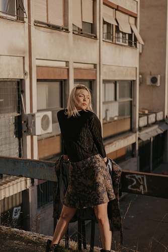 clothing blonde woman stands in porch sleeve