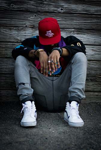 people man wearing grey pants and white low-top sneakers human