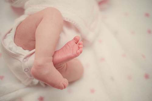 person baby sleeping newborn