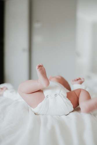 person baby's white onesie human