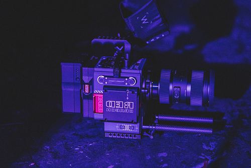black video camera on black surface